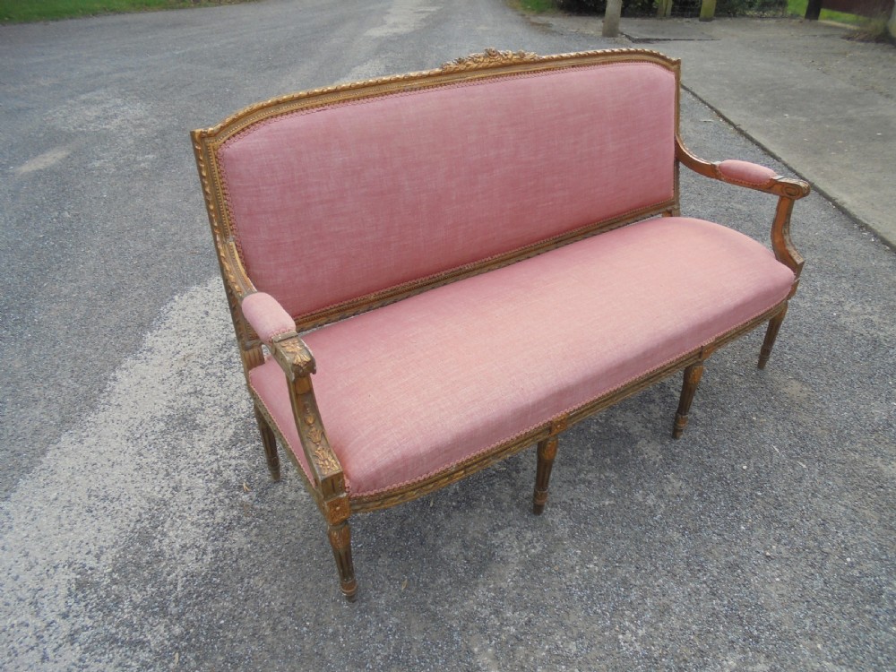 Antique French gilded upholstered sofa