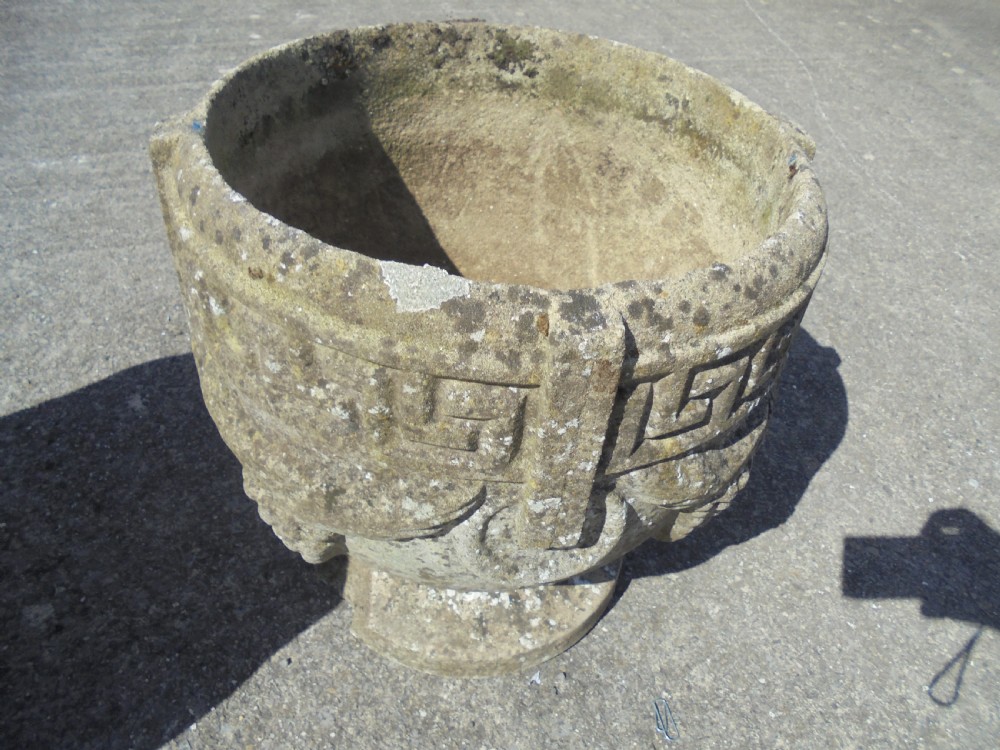Pair of weathered sandstone garden urns planters View II
