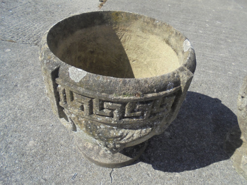 Pair of weathered sandstone garden urns planters View III