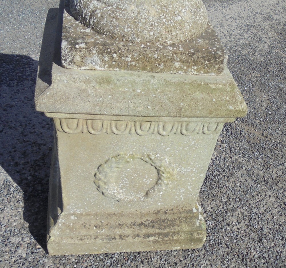 Weathered sandstone garden urn on stand View II