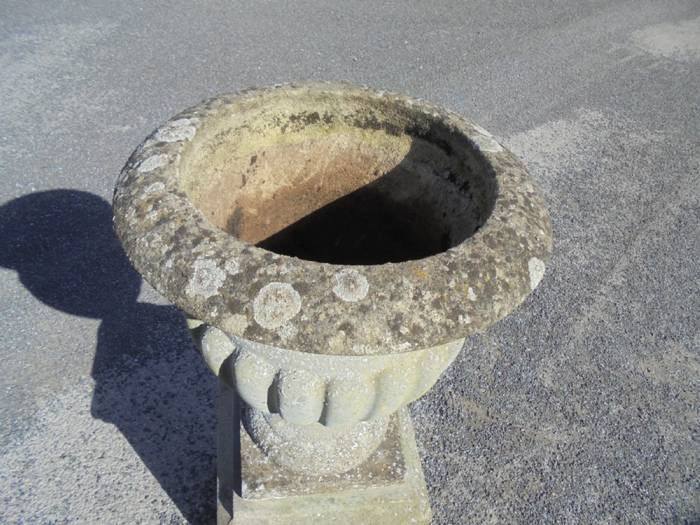 Weathered sandstone garden urn on stand View III