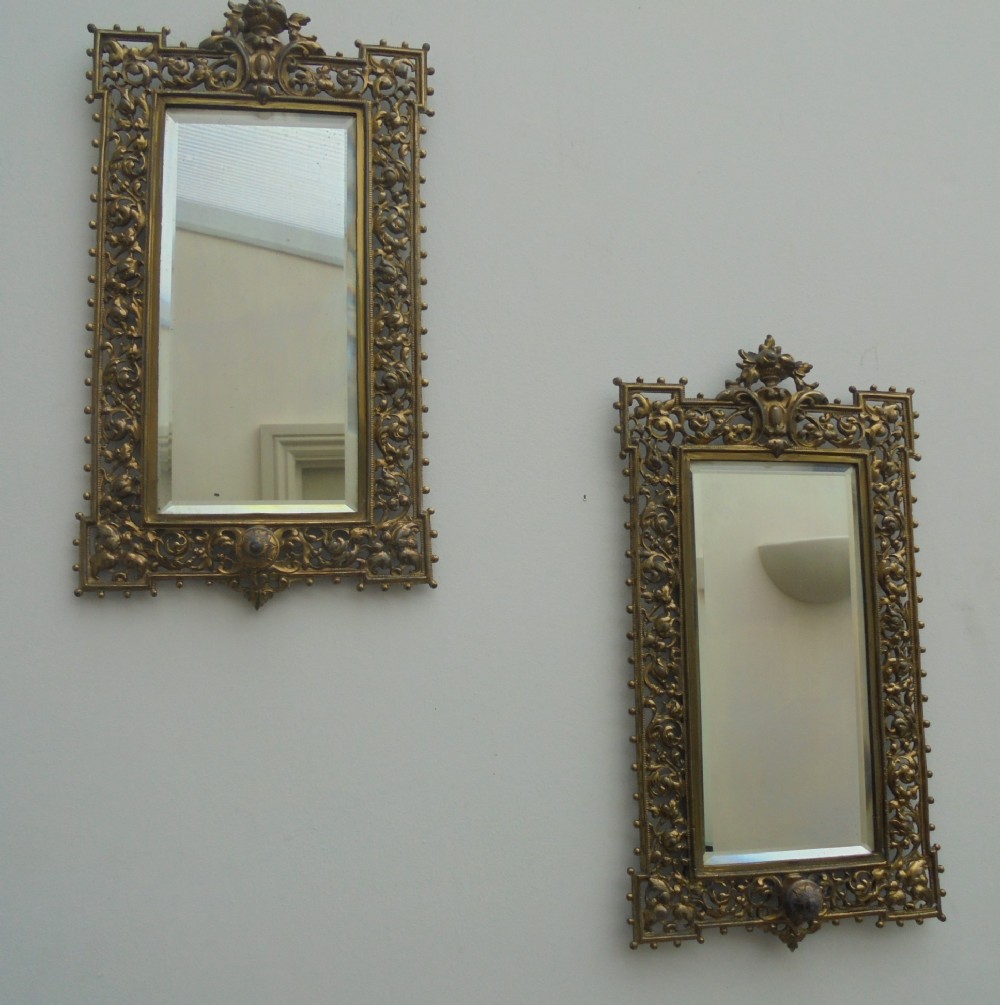 Pair gilded bronze decorative wall mirrors