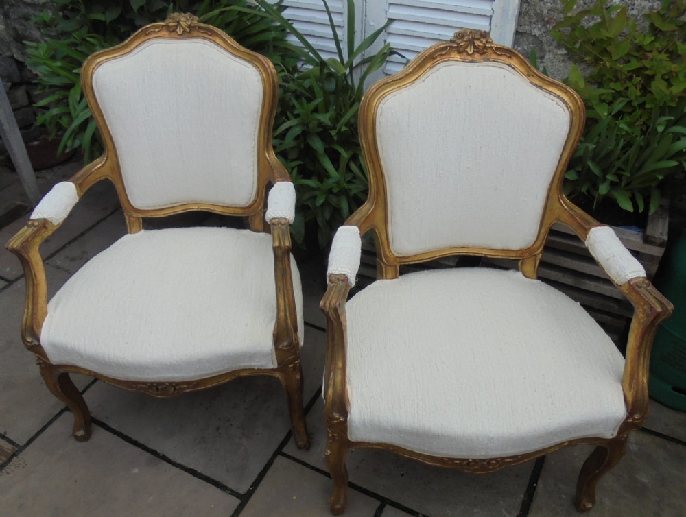 Pair of French gilded armchairs