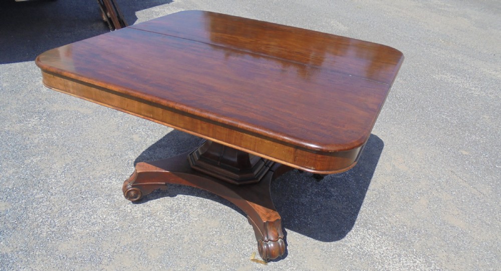 Early Victorian extending mahogany dining table seats twelve View IV