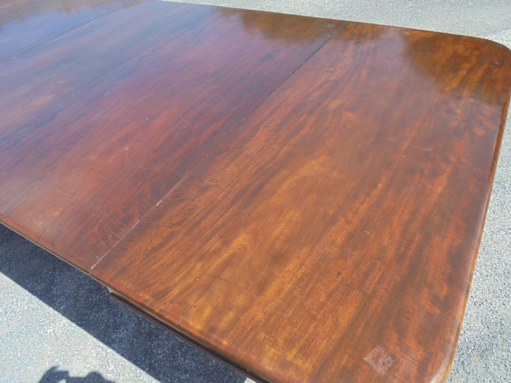 Early Victorian extending mahogany dining table seats twelve View VIII