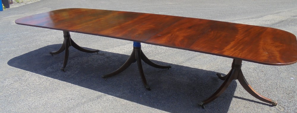 Three pillar mahogany dining table seats fourteen plus