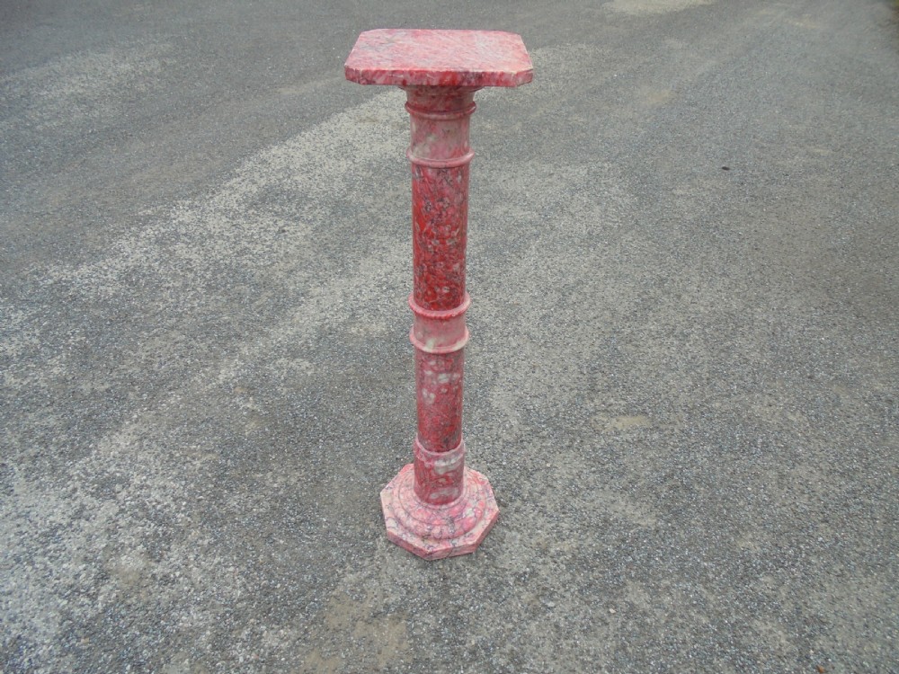 Rouge marble torchere stand