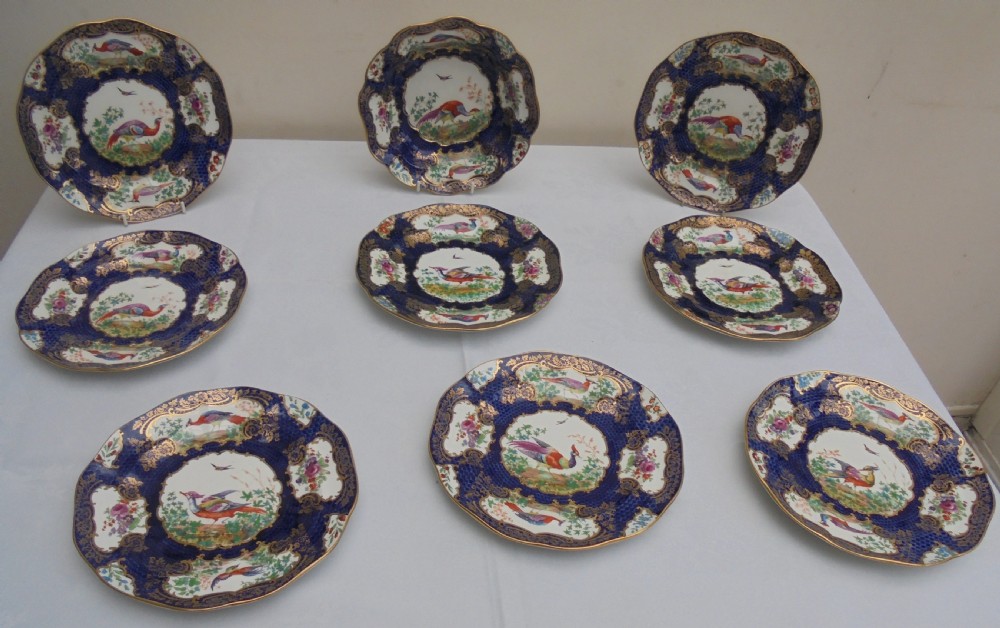 Nine 19th century part dessert service display plates