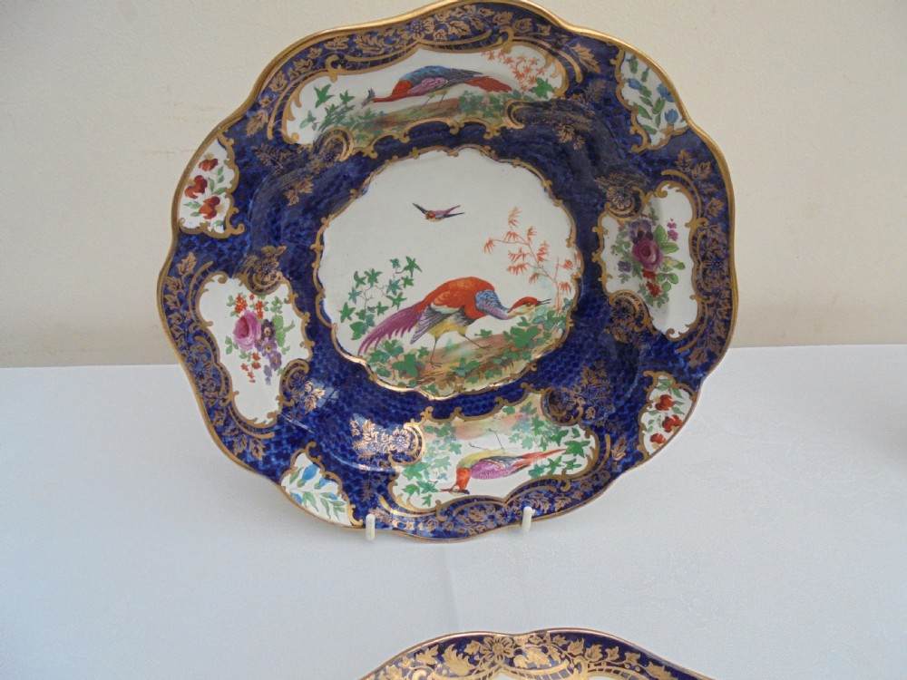Nine 19th century part dessert service display plates View II