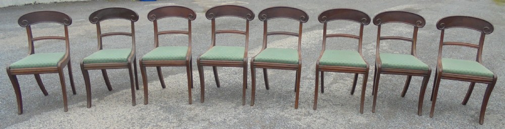 Set of eight Regency  sabre leg dining chairs