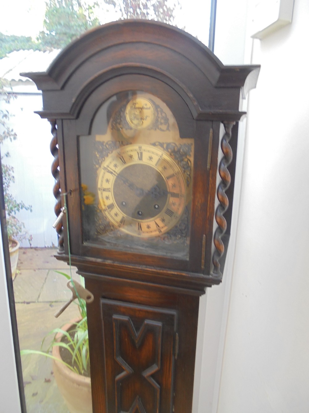 Jacobean style oak Grandmother clock View IX