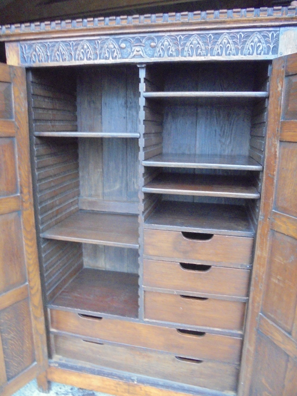 Panelled oak linen press storage View IV
