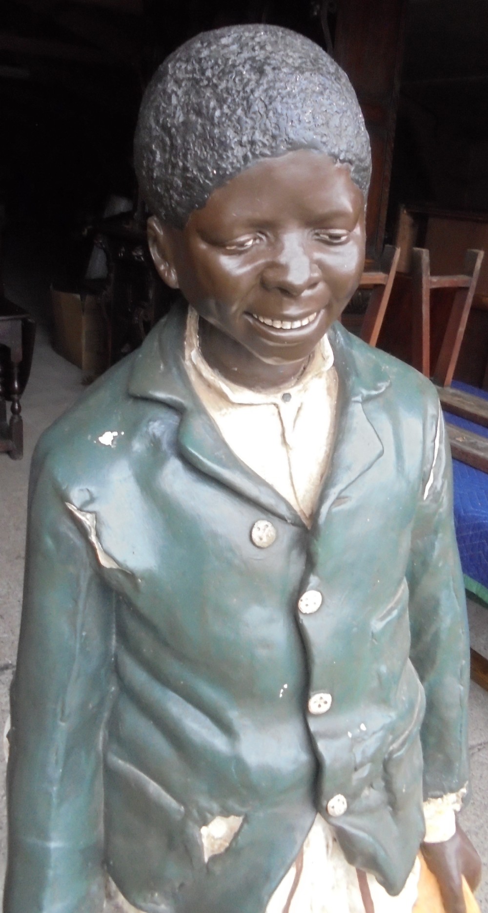 Life size painted plaster figure of  a boy View II