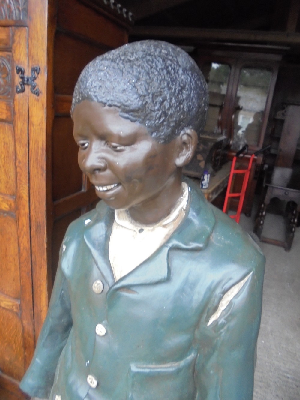 Life size painted plaster figure of  a boy View III