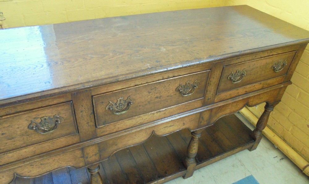 English oak pot board three drawer dresser base View II