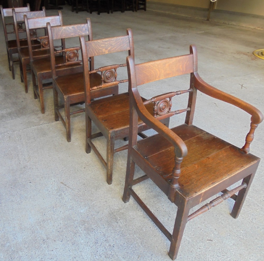 Set of six country oak dining or kitchen chairs