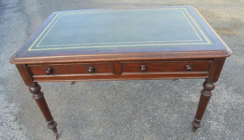 Mahogany leather top writing desk
