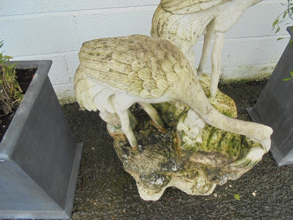 Weathered Carved marble statue of two cranes feeding  View II