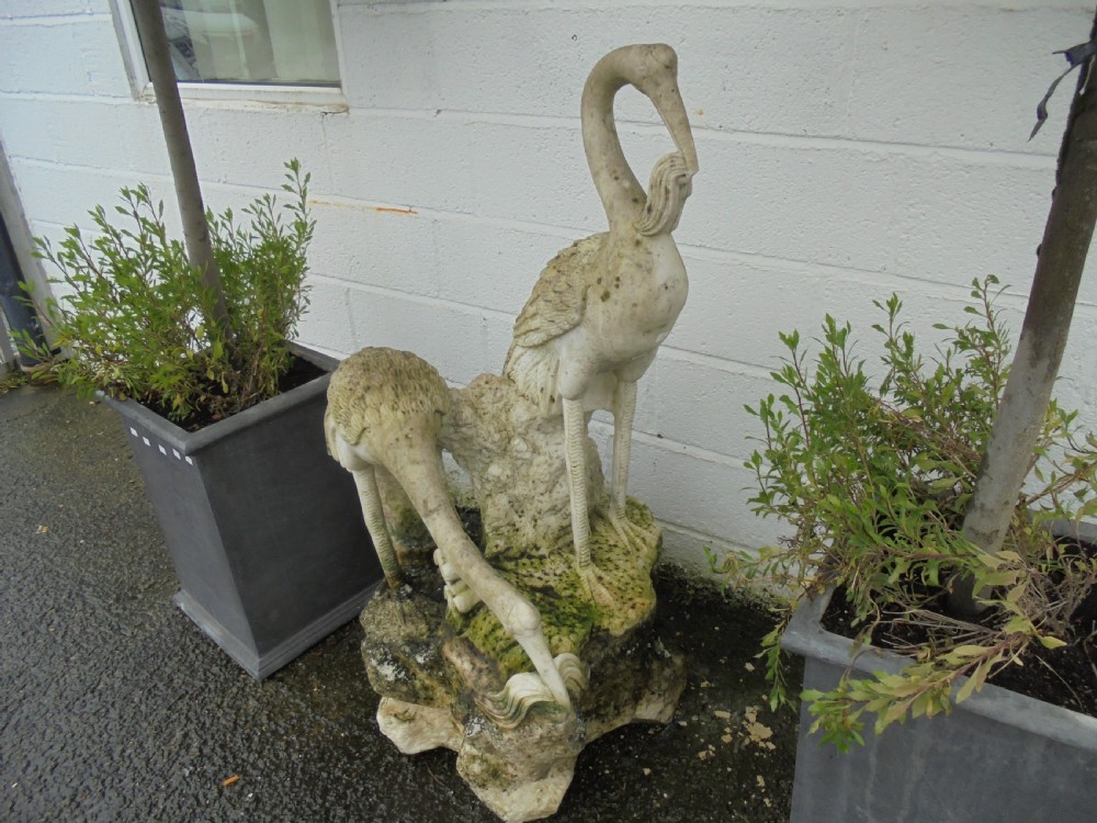 Weathered Carved marble statue of two cranes feeding  View III