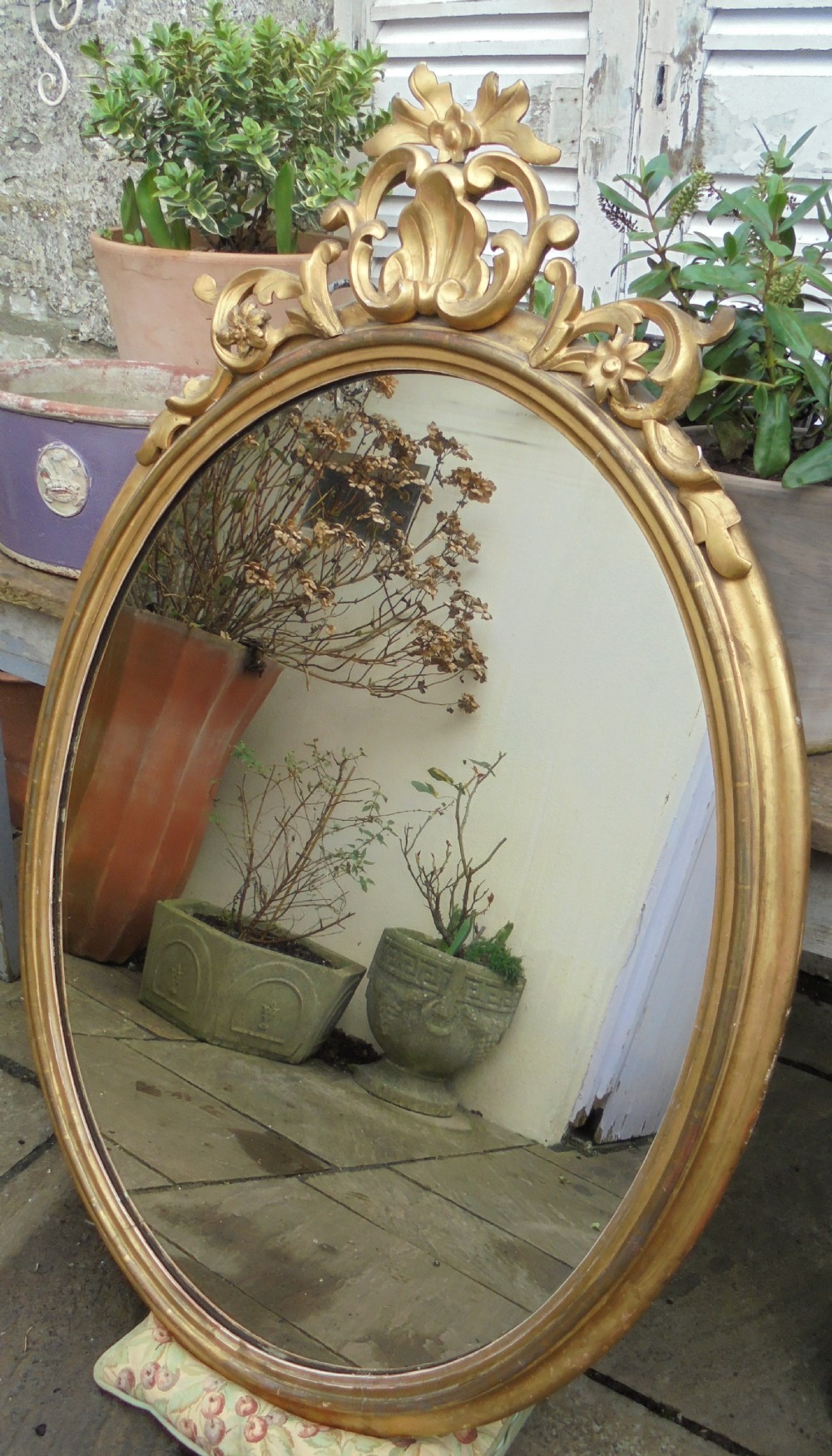 Large 18th century oval gilded wood wall mirror View V