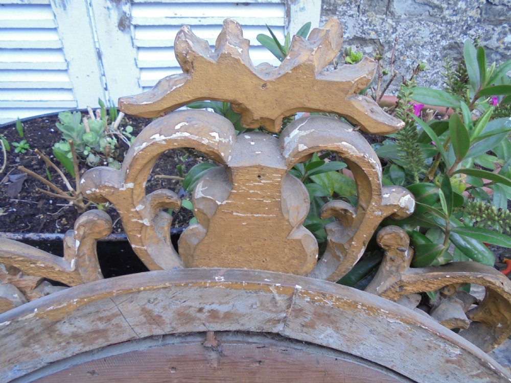 Large 18th century oval gilded wood wall mirror View VIII