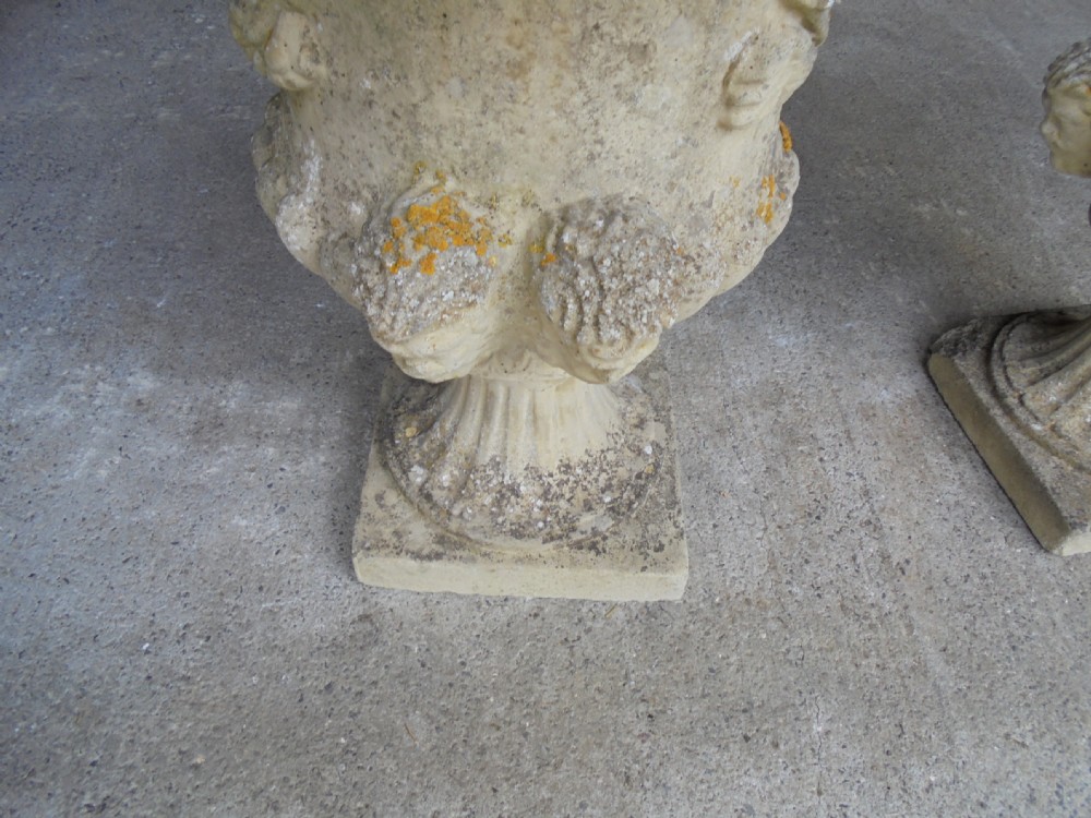 Pair well weathered stone garden urns View III