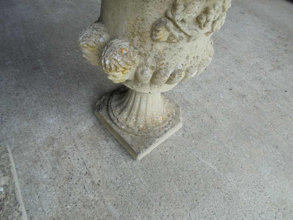 Pair well weathered stone garden urns View IV