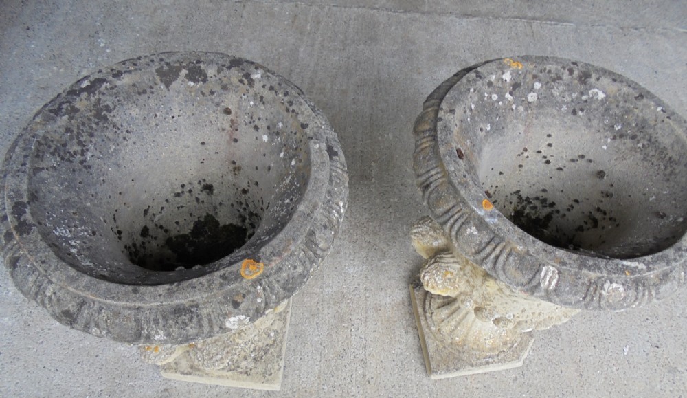 Pair well weathered stone garden urns View VI