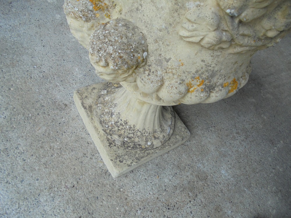 Pair well weathered stone garden urns View VII