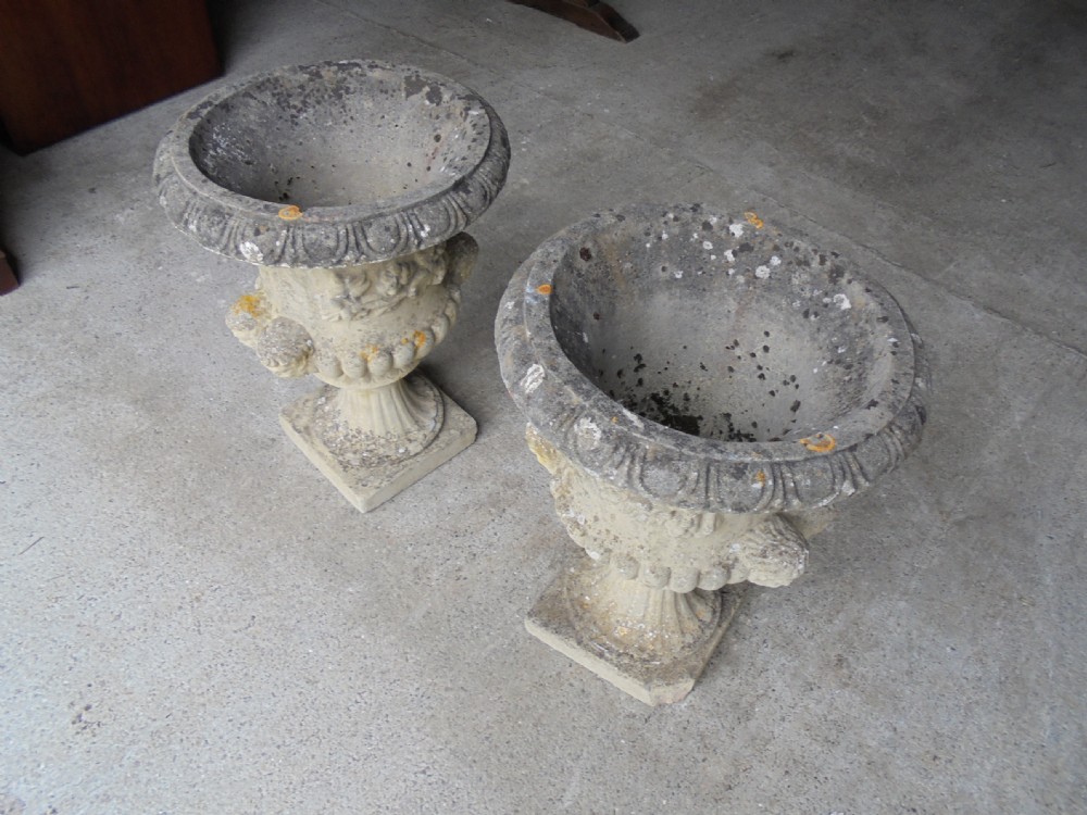 Pair well weathered stone garden urns View VIII
