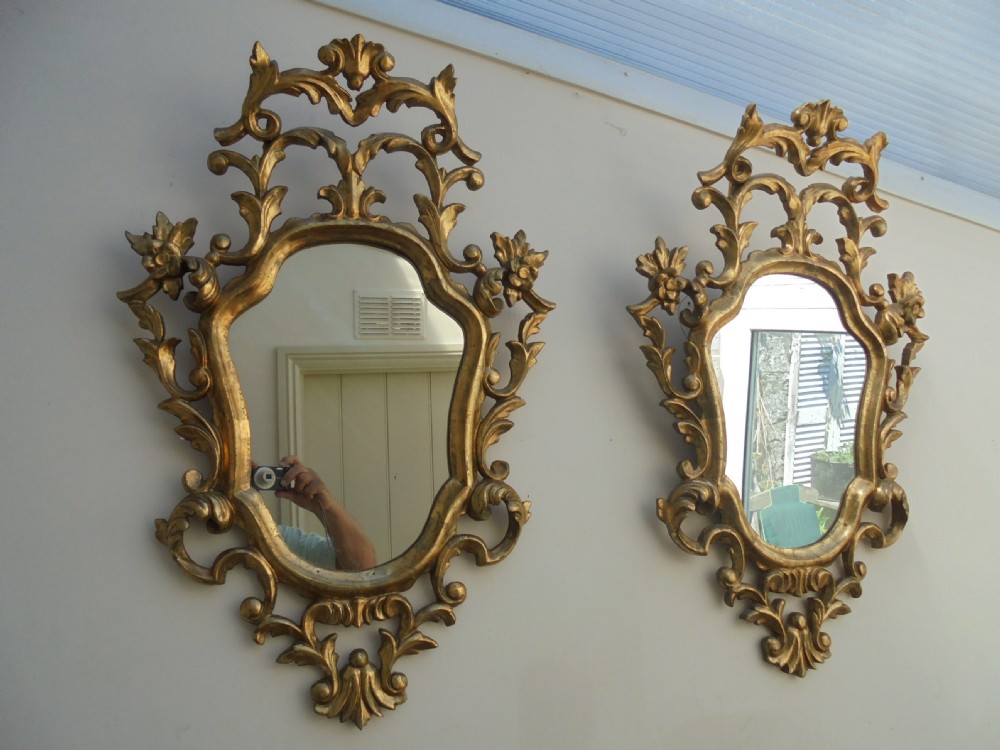 Pair of gilded carved wood wall mirrors