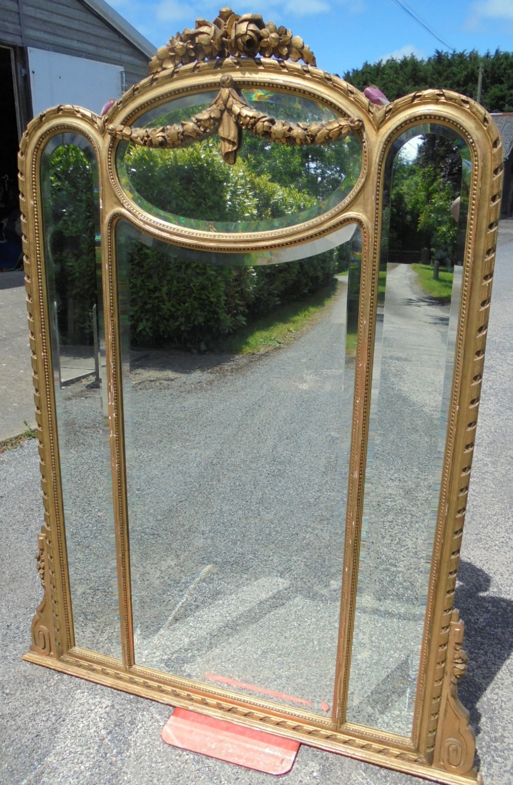 Large giltwood overmantle mirror.