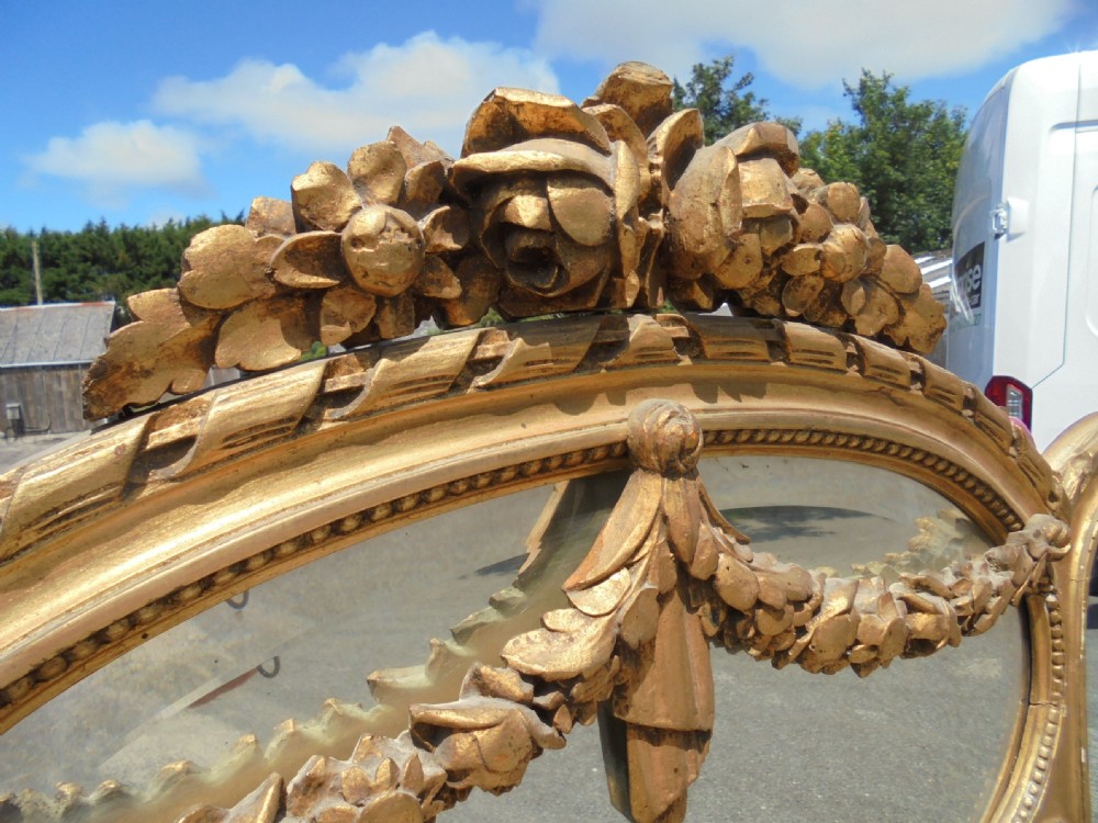 Large giltwood overmantle mirror. View VII