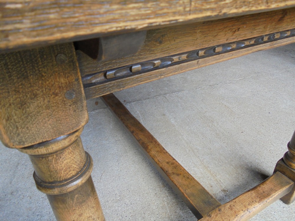 19th century pale oak extending refectory dining table Seats ten View III