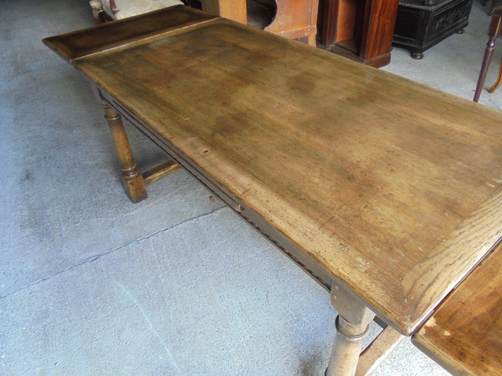 19th century pale oak extending refectory dining table Seats ten View IV