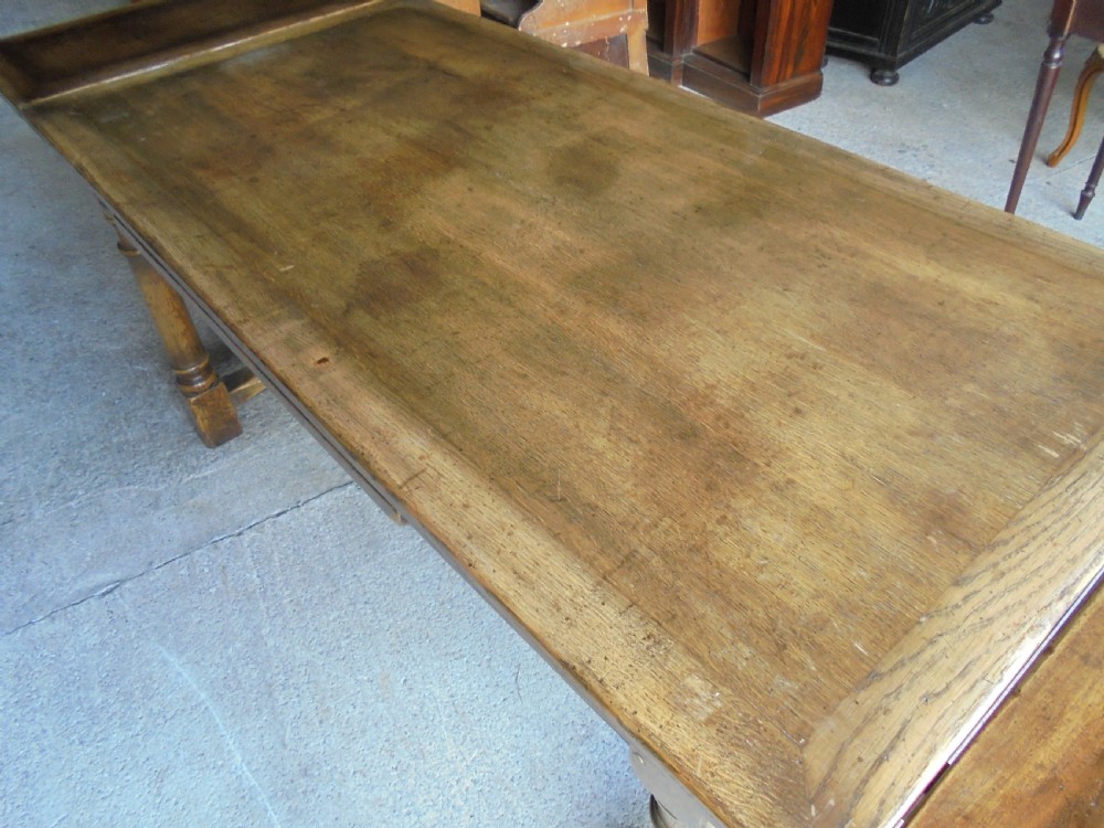 19th century pale oak extending refectory dining table Seats ten View VI