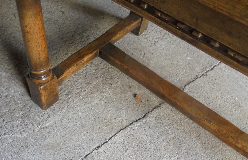 19th century pale oak extending refectory dining table Seats ten View VII