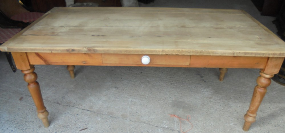 Pine scrub top kitchen dining table. Seats eight View VII