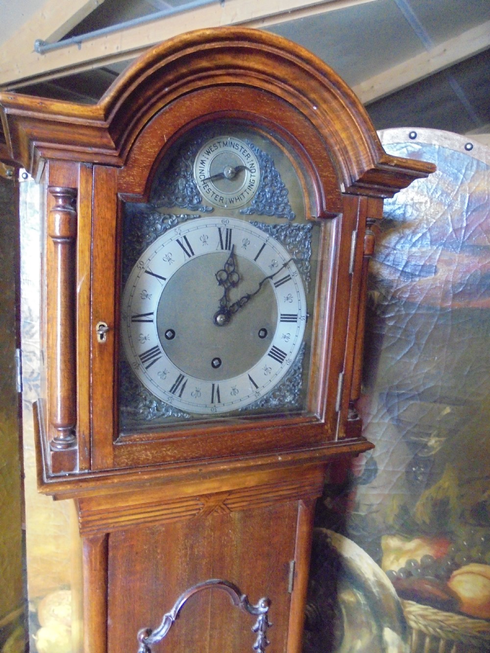 Walnut  Grandmother clock. Brass face and chiming View III