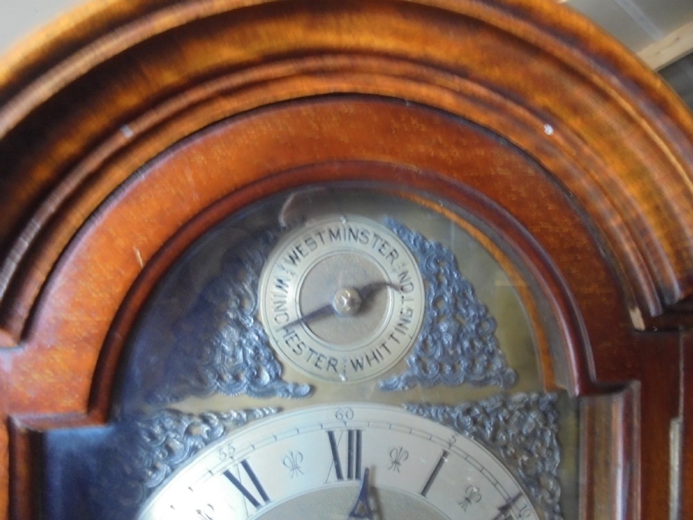 Walnut  Grandmother clock. Brass face and chiming View IV