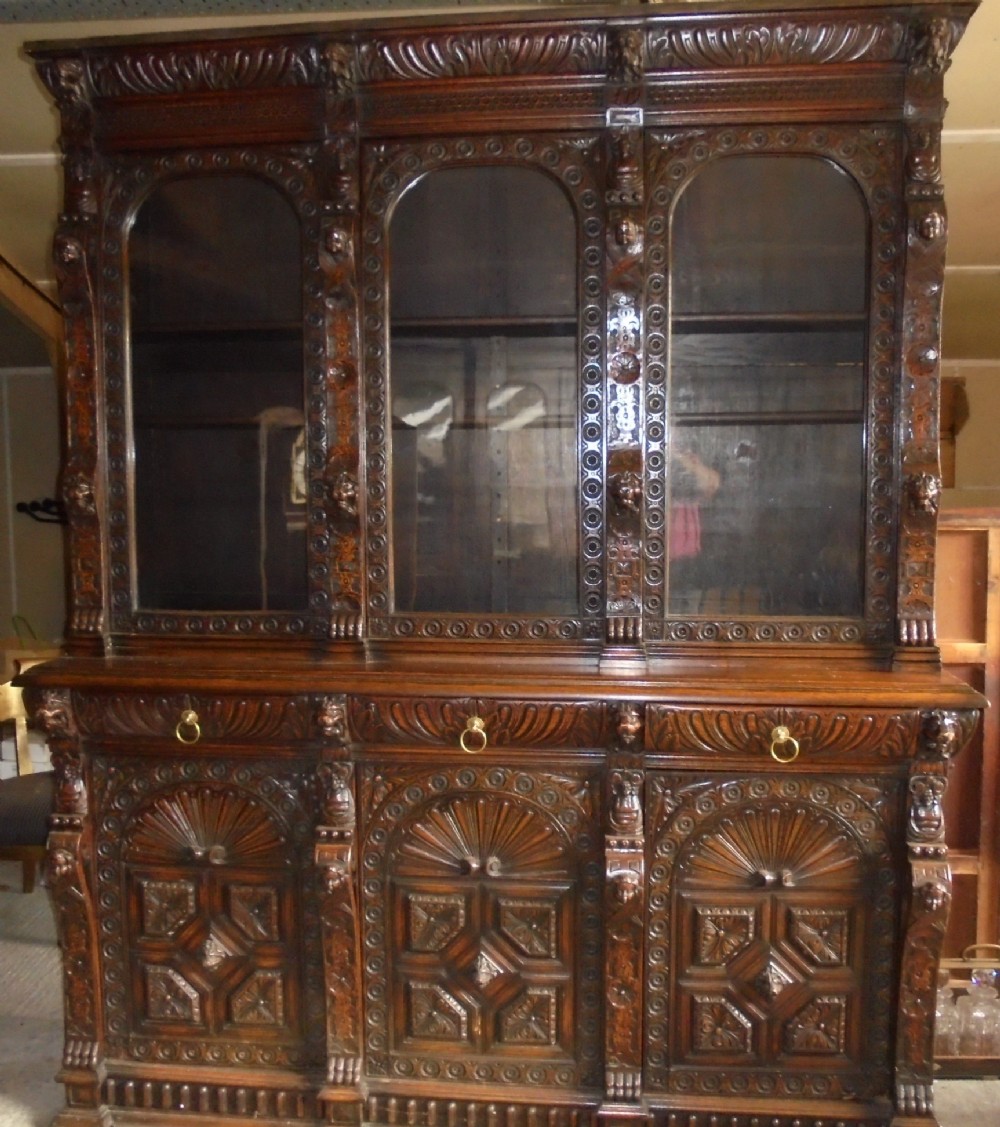 19th century carved oak three door bookcase