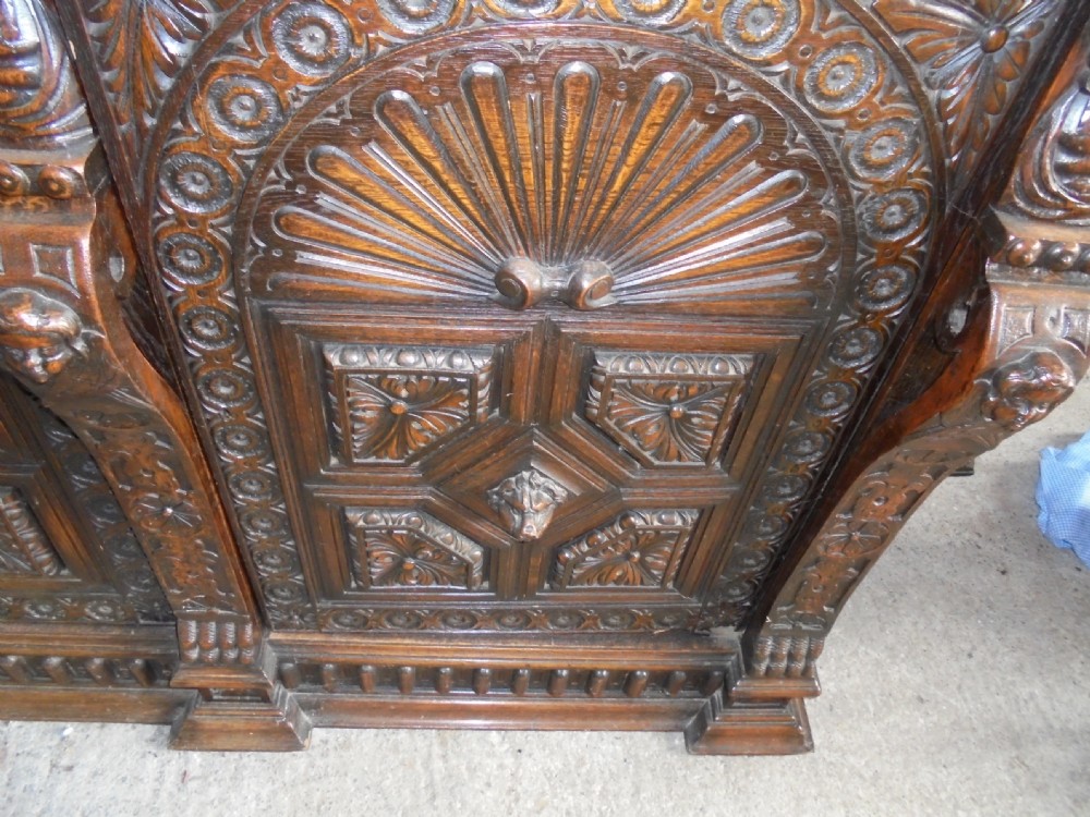 19th century carved oak three door bookcase View VIII