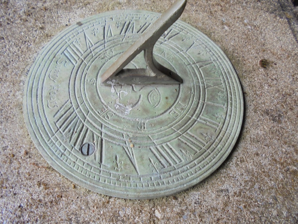Sun dial on well weathered stand  View IV