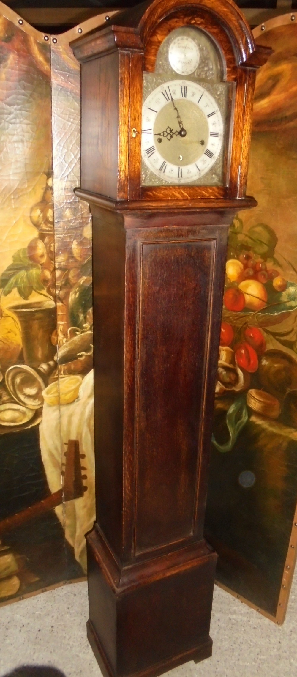 Eight day striking oak Grandmother clock