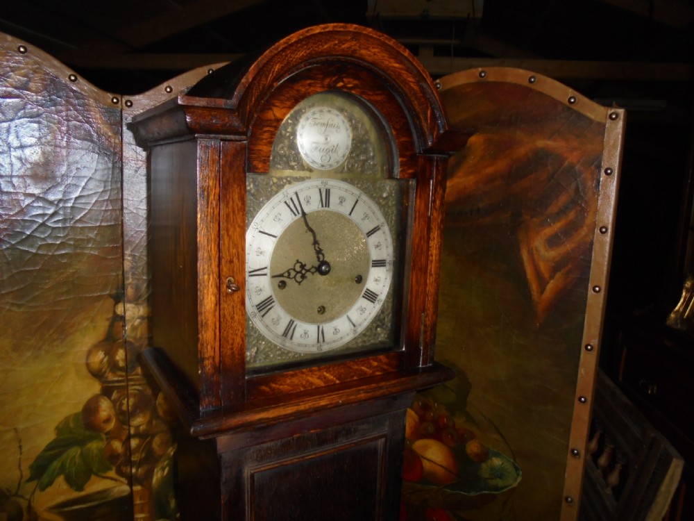Eight day striking oak Grandmother clock View VI