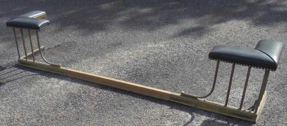 Victorian brass and leather club fender