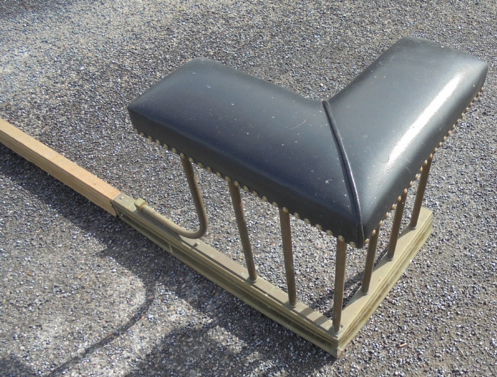 Victorian brass and leather club fender View III