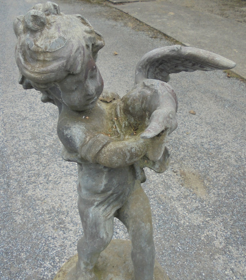 Delightful lead fountain of boy and goose on well weathered stand View VI