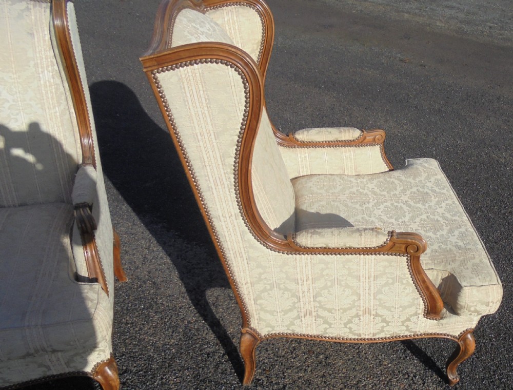 Pair French walnut wingback armchairs View V