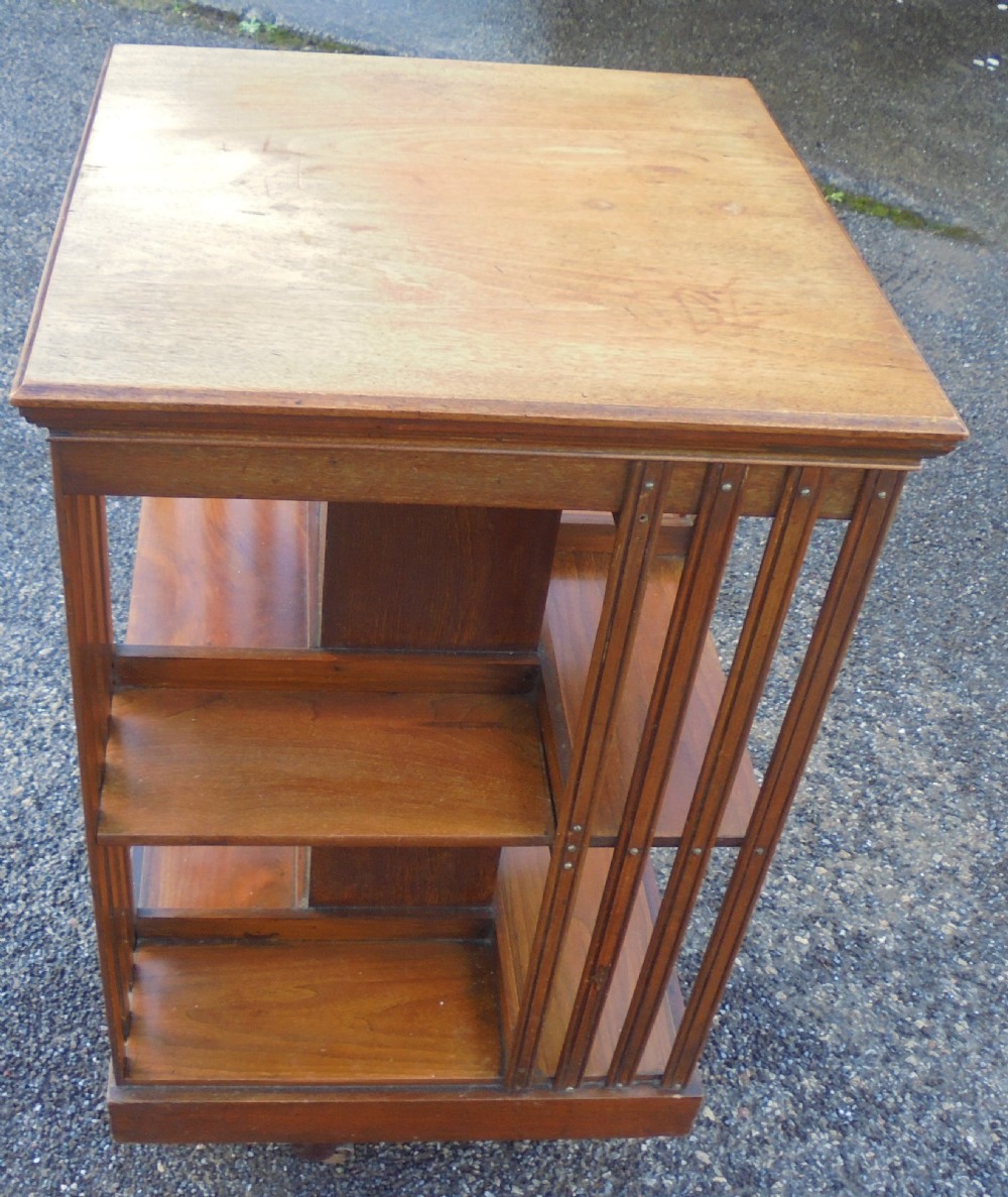 Walnut two tier revolving bookcase View III